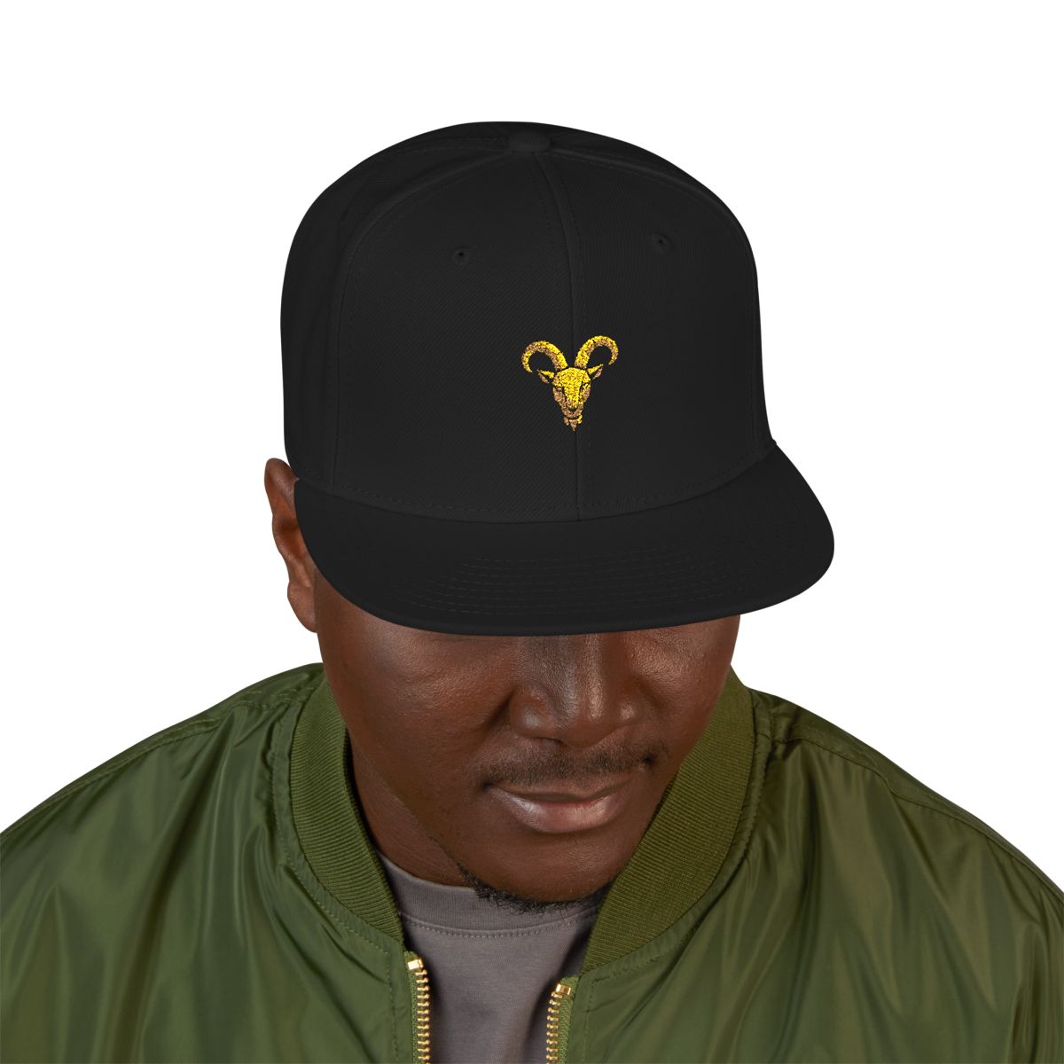 The Goated Planner snapback hat — gold goat mark on black